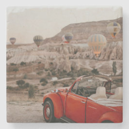 Klassieke  rode auto die warme luchtballonnen kijk stenen onderzetter