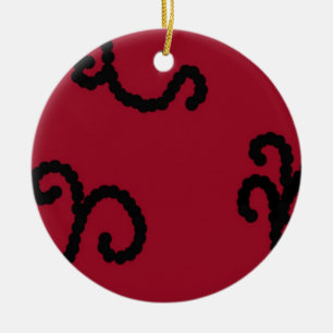 Klassieke rode en zwarte kralenwerveling keramisch ornament