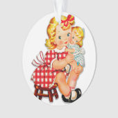 Klein meisje met pop ornament (voorkant)