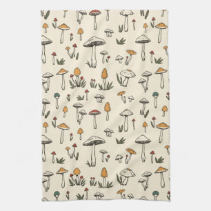Kleine bos-paddenstoelen op een beige achtergrond theedoek