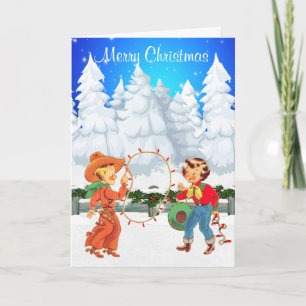 Kleine cowboy en cowgirl met touw lichten winter feestdagen kaart