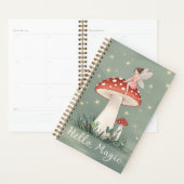 Kleine fee neergestreken op de top van paddenstoel planner (Display)