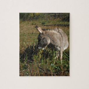 Kleine grijze Donkey met wilde bloemen Legpuzzel