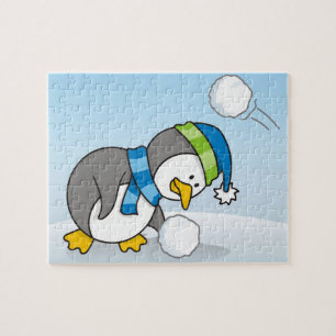 Kleine pinguïn die een sneeuwbal krijgt legpuzzel