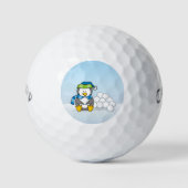 Kleine pinguïn die zit met sneeuwballen golfballen (Voorkant)