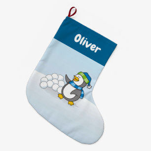Kleine pinguïn met sneeuwbalken grote kerstsok
