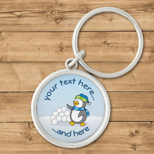 Kleine pinguïn met sneeuwballen sleutelhanger