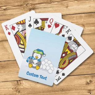 Kleine pinguïn zittend met sneeuwballen speelkaart pokerkaarten