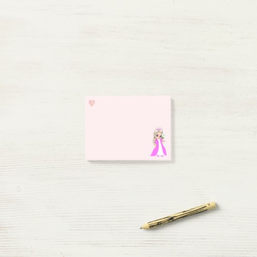Kleine prinses op lichtroze post-it® notes (Op bureau)