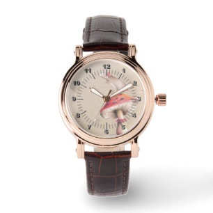 Kleine rode paddenstoel met muis horloge