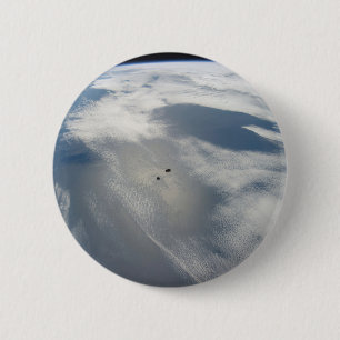 Kleine satellieten draaien boven een deel van de a ronde button 5,7 cm
