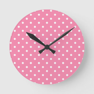 Kleine witte stippen op hete roze ronde klok