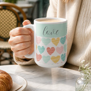 Kleurige mok met liefde en harten
