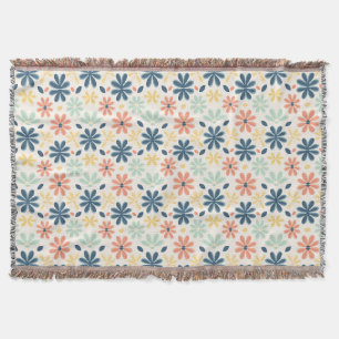 Kleurrijk bloemmotief in blauw, roze en geel deken