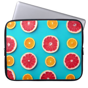 Kleurrijk fruitpatroon van vers sinaasappel en ver laptop sleeve