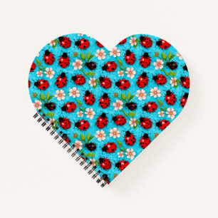 Kleurrijk lieveheersbeestjespatroon met bloemen notitieboek