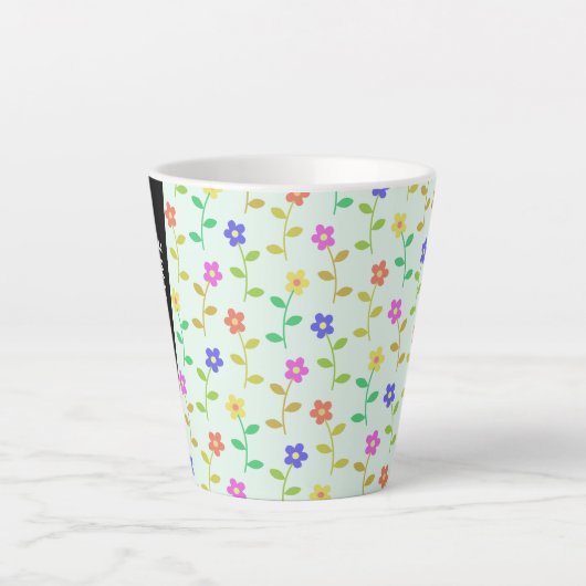 Kleurrijke bloemen, lichtgroene achtergrond, zwart latte mok (Voorkant)