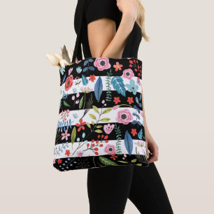 Kleurrijke bloemen over zwarte en witte strepen tote bag