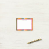 Kleurrijke diagonaal-strips post-it® notes (Op bureau)