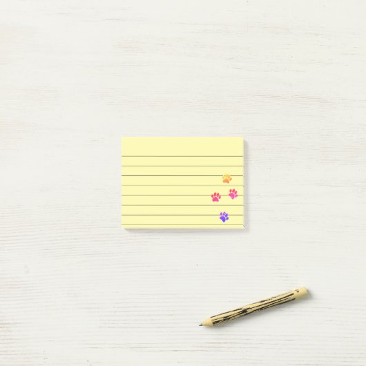 Kleurrijke Dog Paw Tracks, gerelineerd 4x3 Post-it® Notes (Op bureau)