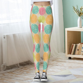 Kleurrijke geometrische abstracte cirkels op crème leggings