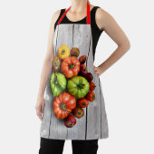 Kleurrijke gestripte tomaten op de weerstabel schort (Insitu)