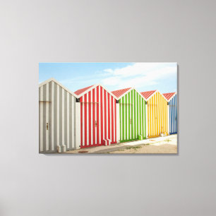 Kleurrijke huiden op strand canvas afdruk