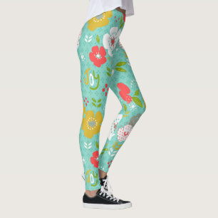 Kleurrijke kerstbloemen en tekstvreugde leggings