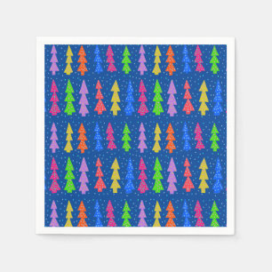 Kleurrijke kerstbomen op blauw servet