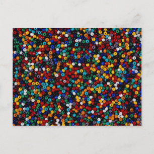 Kleurrijke kralen voor decoratieve werken briefkaart