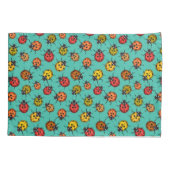 Kleurrijke ladybugs op turkooizen kussensloop (Achterkant)