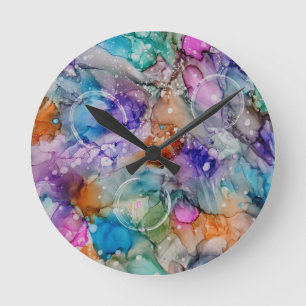 Kleurrijke oranje, paarse, roze, blauwe abstracte ronde klok