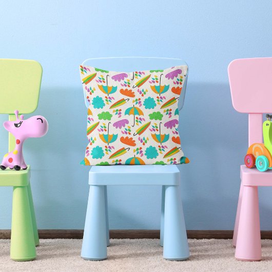 Kleurrijke paraplu's met wolken en regendruppels kussen