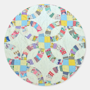 Kleurrijke patchwork quilt ronde sticker