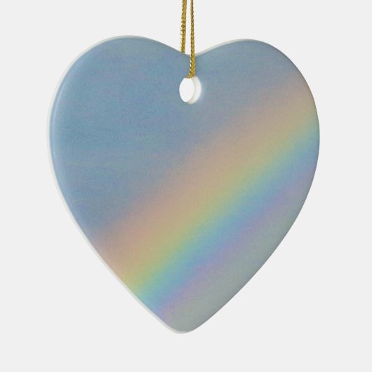 Kleurrijke regenboog in blauwe lucht, jonge vrouw keramisch ornament (Rechts)