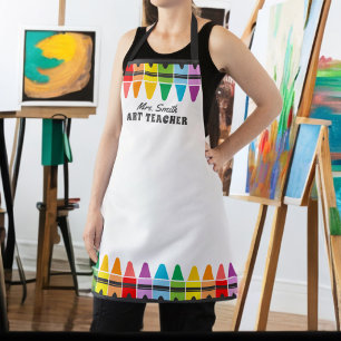 Kleurrijke regenboogkrayons Kunstleraar gepersonal Schort