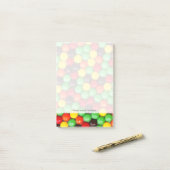Kleurrijke snoepjes post-it® notes (Op bureau)