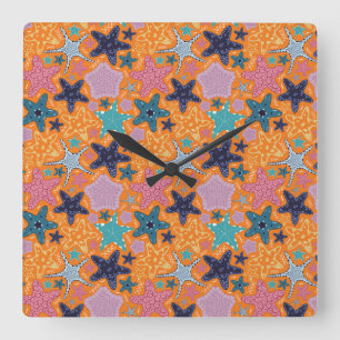 Kleurrijke Starfishes met oranje kleur achtergrond Vierkante Klok