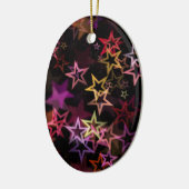 Kleurrijke sterren dansen grillig keramisch ornament (Links)