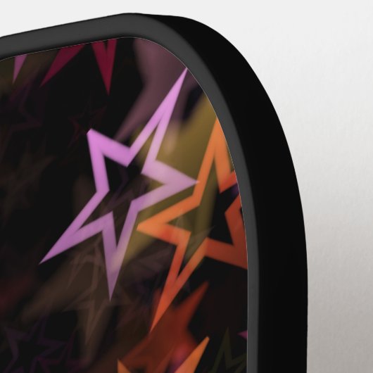 Kleurrijke sterren dansen grillig pickleball paddle (Links Detail)