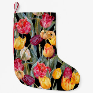 Kleurrijke tulpen, geïsoleerde zwarte achtergrond. kleine kerstsok