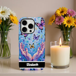Kleurrijke vlinders en handen geschilderd op artis iPhone 16 pro hoesje