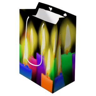 Kleurrijke vogelkaarsen op zwart medium cadeauzakje