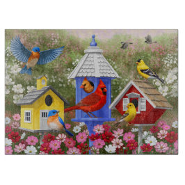 Kleurrijke vogels en vogelhuizen snijplank