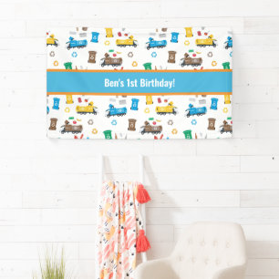 Kleurrijke vuilniswagens en -bakken van afgelopen spandoek