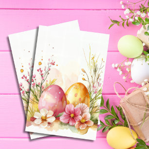 Kleurrijke waterverf paaseieren en bloemen tissuepapier