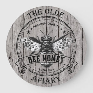 Klok met vintage houten bijenmotief voor aan de mu