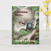 Koala mâchant une carte d'anniversaire de feuille (Fleur jaune)