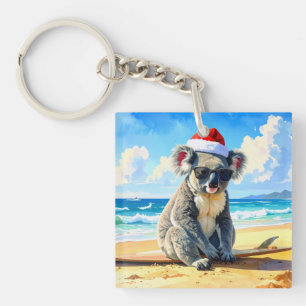 Koala met kerstmuts geniet van zon en branding sleutelhanger