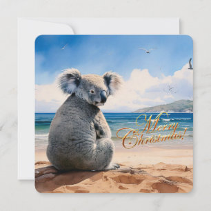 Koala op een zandstrand Vrolijk kerstfeest Feestdagenkaart
